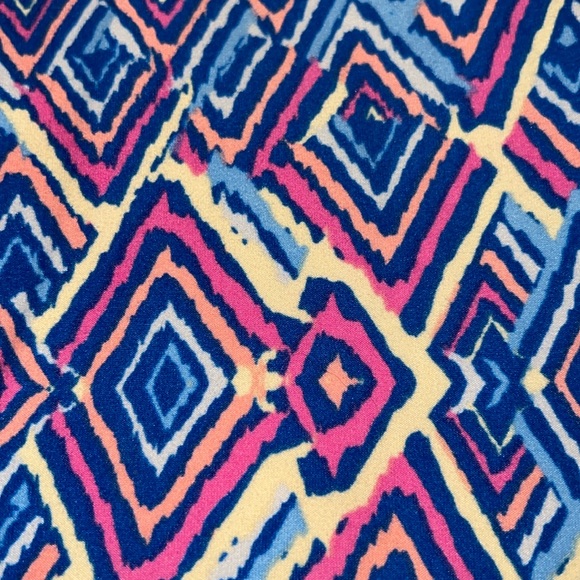 LuLaRoe size small buttery soft leggings in a geometric tribal print - Picture 3 of 3